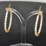 Vergoldete Creolen / Ohrringe aus 925 Sterling Silber mit 58 Zirkonia im Brillantschliff (Diamantimitationen)