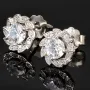 Fein gearbeitete Blumen-Ohrstecker aus 925er Silber mit funkelnden Zirkonia – filigran gearbeitet und stilvoll in Krappen gefasst
