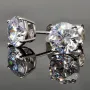 Glänzende Ohrstecker aus rhodiniertem 925er Sterling Silber, besetzt mit funkelnden Zirkonia (Diamantimitation) im Brillantschliff