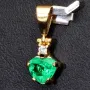 Kolumbianischer, leuchtend grasgrüner Anhänger aus 18K / 750 Gold bestückt mit einem Smaragd mit aufwendigem Herzschliff (ca. 0,74 ct.) und einem Brillanten (ca. 0,03 ct.) in edlen Krappen gefasst - Handarbeit