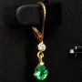 Exquisite Ohrhänger / Ohrringe mit 2 Smaragdtropfen (ca. 0,94 ct.) mit eingefassten Diamanten ( ca. 0,06 ct.) und Klappbrisuren in 18K / 750 Gold gefasst - in Handarbeit hergestellt