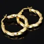 Edle Twist - Creolen in zeitlosem, filigranen Greco - Design aus hochwertigem 585er / 14K Gold