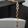 Glänzendes Goldarmband mit Infinity-Elementen mit weißen Zirkoniasteinen in 585 14K Gold in (ca. 18,5 cm Länge, ca. 6 mm Breite)
