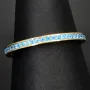 Funkelnder Ring aus 14K 585 Gold mit strahlenden, hellblauen, türkisen Zirkonia bestückt Ringgröße ca. 50