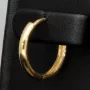 Mini-Creolen aus glänzend poliertem 14K / 585 Gold (Gelbgold) mit praktischem Verschluss