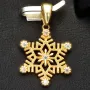 Schneeflocke - Anhänger aus edlem Gold (14K 585 Gelbgold) mit funkelnden Zirkonia besetzt