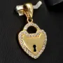 Gold-Anhänger in Herzdesign mit kleinem Schlüsselloch aus 14K / 585 Gold mit leuchtenden Zirkoniasteinen