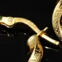 Glänzende Greco-Creolen in zeitlosem Twist-Design aus funkelndem 585er / 14K Gold
