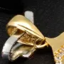 Glänzender Delfin - Anhänger mit Zirkoniabesatz aus hochwertigem Gold 585 / 14 Karat Gelbgold