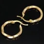 Glänzende Twist - Creolen in stilvollem Greco - Design aus hochwertigem Gold (585 / 14K Gelbgold)