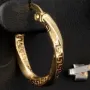 Glänzende Twist - Creolen in stilvollem Greco - Design aus hochwertigem Gold (585 / 14K Gelbgold)