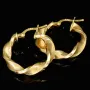 Edle Spiral-Creolen in mit feinem halb polierten, halb mattierten Design aus hochwertigem 585 / 14K Gold