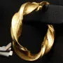 Edle Spiral-Creolen in mit feinem halb polierten, halb mattierten Design aus hochwertigem 585 / 14K Gold