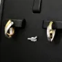 Stilvoll geschwungene Doppel-Creolen aus hochwertigem Bicolor 585 / 14K Gold (Gelbgold und Weißgold) mit feinem Greco-Design