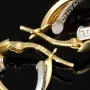 Stilvoll geschwungene Doppel-Creolen aus hochwertigem Bicolor 585 / 14K Gold (Gelbgold und Weißgold) mit feinem Greco-Design
