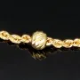 Hochwertig produziertes Twist-Armband / Kordelarmband mit stilvoll eingearbeiteter Goldperle aus edlem 585 14k Gold, ca. 2mm breit, 19cm lang