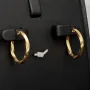 Glänzende Spiral-Ohrringe / Twist-Creolen mit feinem Greco-Muster aus exquisitem 585 / 14K Gold