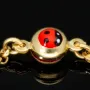 Baby-Armband mit Gravurplättchen und Marienkäfer-Element aus hochwertigem 14k (585) Gold in ca. 14 cm Länge