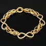 Exklusives Goldarmband mit eingearbeiteten Unendlichkeits-Elementen präzise besetzt mit weißen Zirkoniasteinen in 585 14K Gold in (ca. 20 cm Länge, ca. 9 mm Breite)