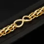 Exklusives Goldarmband mit eingearbeiteten Unendlichkeits-Elementen präzise besetzt mit weißen Zirkoniasteinen in 585 14K Gold in (ca. 20 cm Länge, ca. 9 mm Breite)