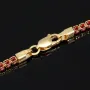 Fein gearbeitetes Tennisarmband aus edlem 585 / 14K Gold mit funkelnden pink-lila Zirkoniasteinen besetzt (ca. 17,5 cm)