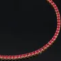 Fein gearbeitetes Tennisarmband aus edlem 585 / 14K Gold mit funkelnden pink-lila Zirkoniasteinen besetzt (ca. 17,5 cm)