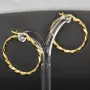 Glänzend polierte Twist - Creolen aus edlem Gold (14K 585 Gelbgold)