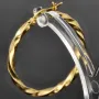 Glänzend polierte Twist - Creolen aus edlem Gold (14K 585 Gelbgold)