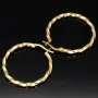 Glänzend polierte Twist - Creolen aus edlem Gold (14K 585 Gelbgold)