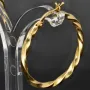 Glänzend polierte Twist - Creolen aus edlem Gold (14K 585 Gelbgold)