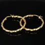 Glänzend polierte Twist - Creolen aus edlem Gold (14K 585 Gelbgold)