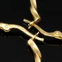 Glänzend polierte Twist - Creolen aus edlem Gold (14K 585 Gelbgold)