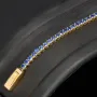 Trendiges Tennisarmband mit funkelnden, dunkelblauen Zirkonia aus hochwertigem 14K 585er Gold in (ca. 18,5 cm Länge)