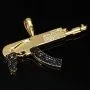 Hochwertig gearbeiteter Maschinengewehr-Anhänger aus edlem, hochglanzpoliertem 585 / 14K Gold fein besetzt mit Zirkoniasteinen