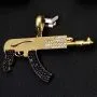 Hochwertig gearbeiteter Maschinengewehr-Anhänger aus edlem, hochglanzpoliertem 585 / 14K Gold fein besetzt mit Zirkoniasteinen