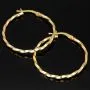 Exquisite Twist - Creolen aus funkelndem, hochglanzpoliertem Gold (14K 585 Gelbgold)
