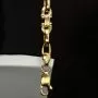 Exquisites Plättchenarmband mit Steigbügelgliedern aus 585er (14-Karat) Gelbgold, ca. 18,5 cm lang und 5,5 mm breit