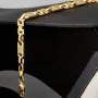 Exquisites Plättchenarmband mit Steigbügelgliedern aus 585er (14-Karat) Gelbgold, ca. 18,5 cm lang und 5,5 mm breit