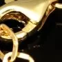 Infinity-Armband aus hochwertigem 585er Gold, 14 Karat, mit funkelnden Unendlichkeitsmotiven, Goldkügelchen in Tricolor (Gelbgold, Weißgold und Roségold) und verstellbarer Länge von 17,5 bis 19 cm