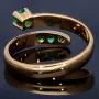 Außergewöhnlicher Solitär -Schlangen Ring bestückt mit insgesamt 4 runden dunkel grasgrünen Smaragden in 18K / 750 Gelbgold, hergestellt in Handarbeit