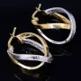 Wunderschöne geschwungene Designer - Creolen in Bicolor 585er (14K) Weiß- und Gelbgold