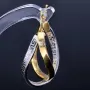 Wunderschöne geschwungene Designer - Creolen in Bicolor 585er (14K) Weiß- und Gelbgold