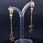 bezaubernde, hängende Sternchen - Ohrringe mit eingefasstem Zirkonia in 585er (14K) Gelbgold
