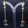 bezaubernde, hängende Sternchen - Ohrringe mit eingefasstem Zirkonia in 585er (14K) Gelbgold