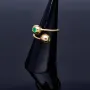 Außergewöhnlicher Designer Ring mit 2 runden, kolumbianischen Smaragden von insgesamt ca. 0,3ct. (RG ca. 53-55)