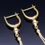 Bezaubernde hängende Ohrringe mit Zirkonia aus 585er (14K) Gold