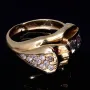 Außergewöhnlicher Panther - Damenring in 585 14 Karat Gelbgold mit Zirkoniabesatz. RG ca. 56