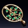 Eindrucksvoller, handgearbeiteter Lebensbaum - Anhänger in 18K / 750 Gold mit 11 leuchtenden, tannengrünen Smaragden