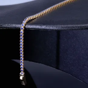 Tennisarmband mit funkelnden, dunkelblauen Zirkonia aus edlem 585 14K Gelbgold in (ca. 18,5 cm Länge)