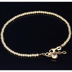 Längenverstellbares Infinity-Armband bestehend aus vielen kleinen Goldkügelchen aus 585 14K Gelbgold in ca. 18,5 - 20 cm Länge mit Zirkoniastein